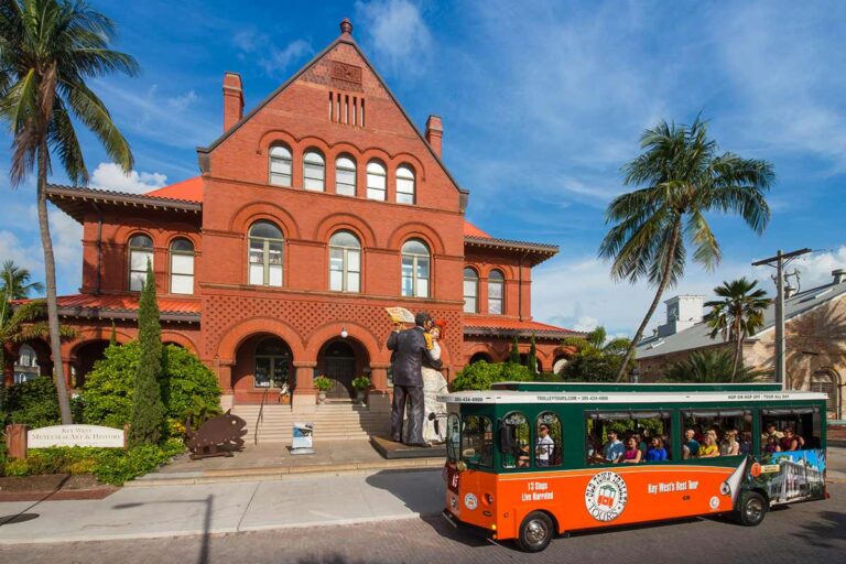 Key West Old Town Trolley driving past Custom House
