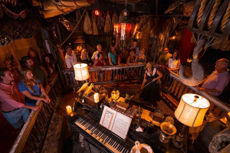 guests and ghost hosts inside Key West Shipwreck Treasure Museum