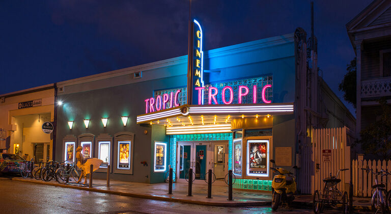 Front view of Tropic Cinema at night in Key West